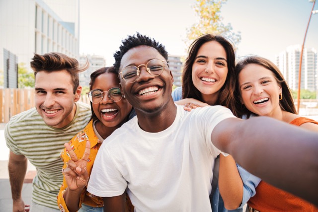 Group of diverse students taking a selfie