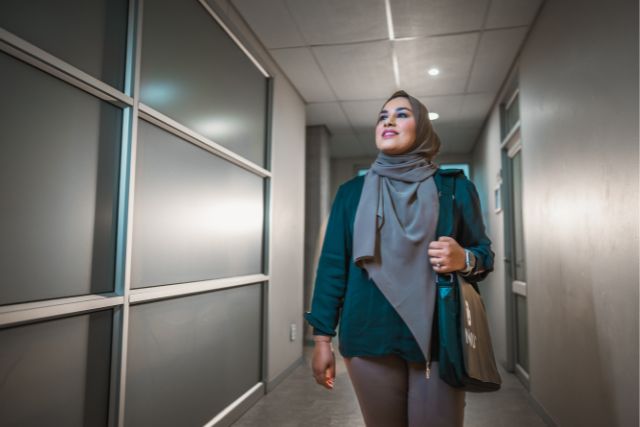 Female wearing hijab looking into her NWU postgrad future
