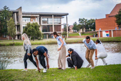 Students at the Vaal campus pond procrastinating