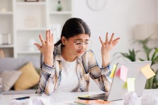 Young lady is frustrated after missing the student application deadline